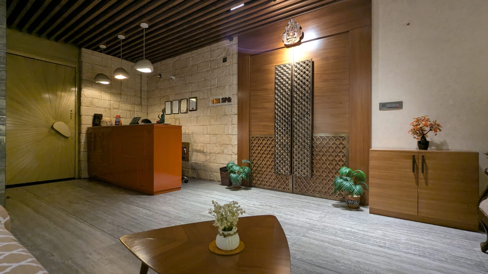 Coral Spa reception with illuminated display shelves